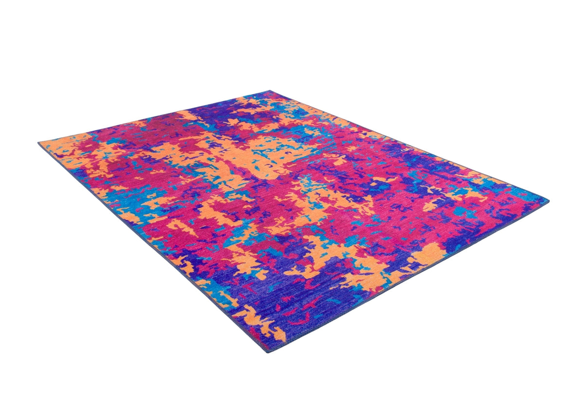 The Celestial Tapestry - Washable Rug - JRS004 features a vibrant abstract pattern in orange, pink, blue, and purple. Perfect for allergy-sensitive homes and high-traffic areas. Shown on a white background. Custom size available.