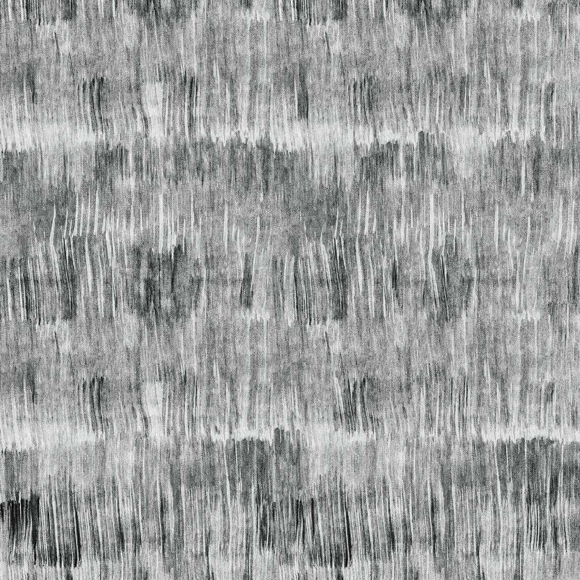 Black and white rug with a distressed, vertical brushstroke ikat pattern.