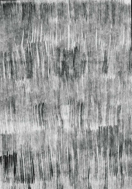 Load image 1 in gallery view. Black and white rug with a vertical, distressed brushstroke pattern and a textured, woven appearance.