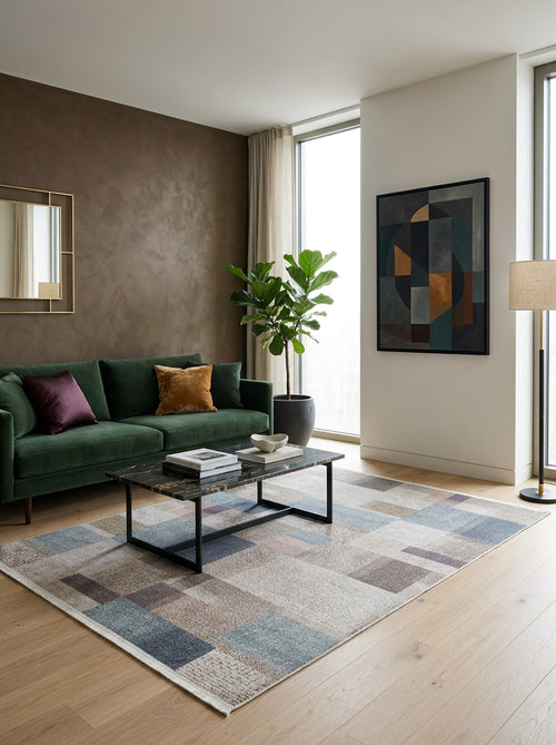 Load image 1 in gallery view. Multicolor geometric block rug in muted blue, grey, and beige tones, styled in a modern living room.