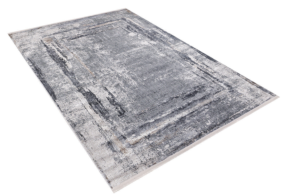 The Classic and Bold - Washable Rug - JR1529 (Custom Size) is a rectangular gray-anthracite rug with a distressed abstract pattern in shades of gray, black, and white, featuring a subtle border and textured look.