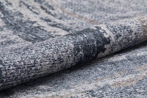 Load image 1 in gallery view. A close-up of the Classic and Bold - Washable Rug - JR1529 (Custom Size), featuring a durable gray and beige woven fabric with a distressed, patterned design that highlights its textured, washable surface.