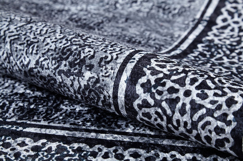 Load image 1 in gallery view. A close-up of the Contemporary Borderline - Washable Rug - JR1798 (Custom Size), featuring a black and white abstract pattern with textured details—perfect for allergy-sensitive homes or high-traffic areas.