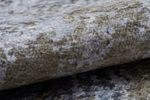 Load image 1 in gallery view. Close-up of the Contemporary Canvas - Washable Rug - JR145 (Custom Size) featuring a textured, velvety surface with mottled gray and olive green tones, ideal for high-traffic areas due to its plush feel and subtle color variations.