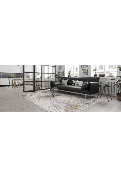 Load image 1 in gallery view. A modern living room with a black sofa, cushions, and the Contemporary Canvas - Washable Rug - JR145 (Custom Size). Large windows brighten the space, with a small coffee table and nearby dining area—ideal for high-traffic areas.