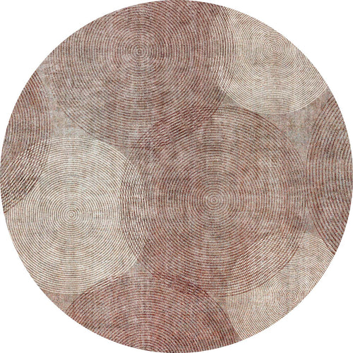 Load image 1 in gallery view. Round rug with overlapping concentric circle patterns in shades of brown, rust, and cream.