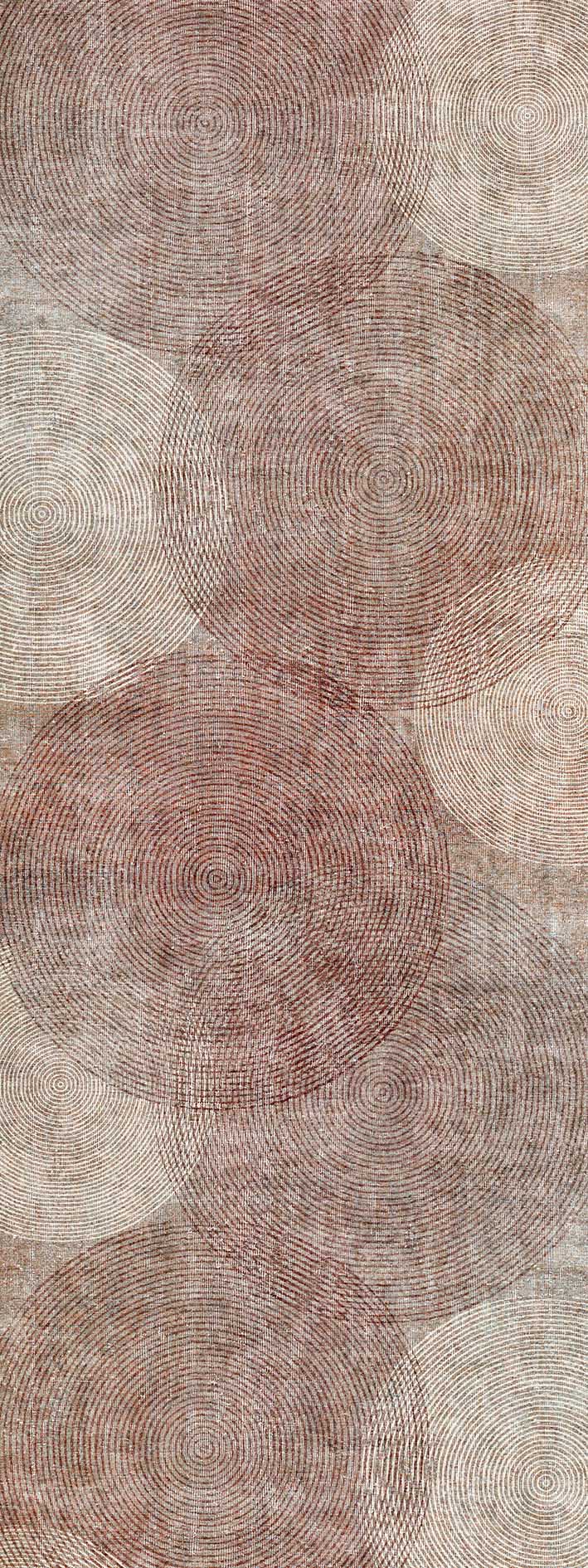 Rust and cream rug featuring an overlapping pattern of concentric circular lines on a textured background.