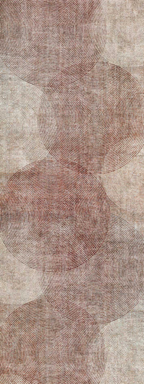 Load image 1 in gallery view. Rust and cream rug featuring an overlapping pattern of concentric circular lines on a textured background.