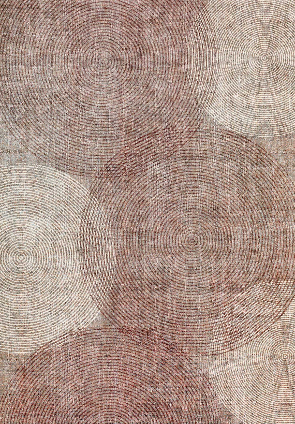 Rust and cream rug featuring an overlapping concentric circle pattern with a textured, distressed finish.