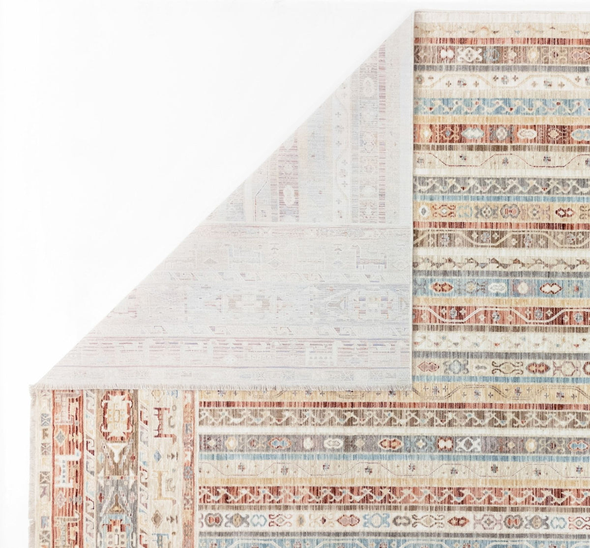 Multi-colored striped rug with geometric patterns in rust, blue, and cream, shown with a corner folded over.
