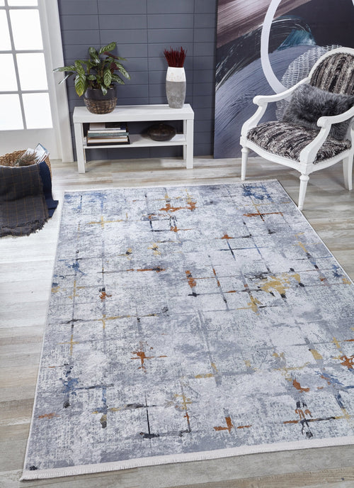 Load image 1 in gallery view. A modern living room featuring the Cross Country - Washable Rug - JR1753 (Custom Size) in gray abstract, a white armchair with patterned cushion, console table, plant, and wall art. Light wood floors and a window make it ideal for high-traffic areas.
