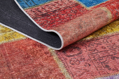 Load image 1 in gallery view. A close-up of the Crosshatch Craze - Washable Rug - JR210 (Custom Size) shows its textured surface and black non-slip backing, perfect for busy spaces, with striking red, yellow, blue, and pink patterns.