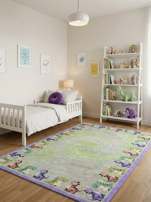 Load image 1 in gallery view. Green swirl-patterned rug with a dinosaur border, styled in a child's bedroom.