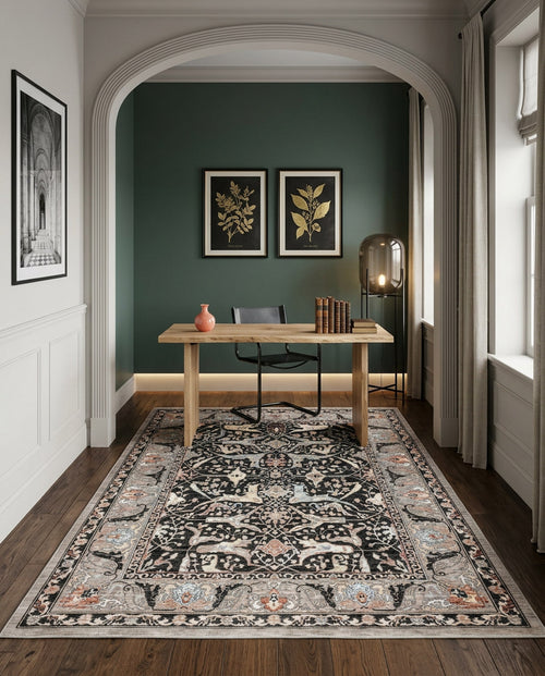 Load image 1 in gallery view. Black and beige traditional floral medallion rug in a home office with dark green walls.