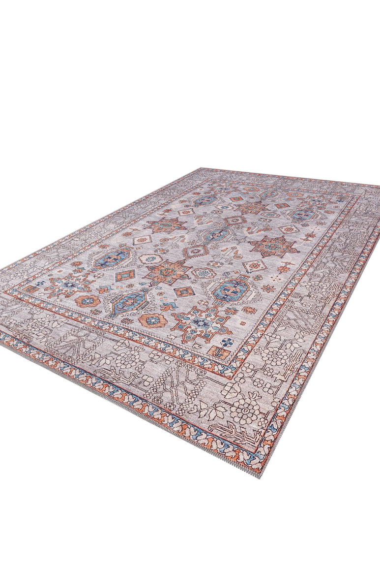 An angled view of the Echelon Bordered Washable Rug - LCC3018 (Custom Size), featuring intricate, colorful geometric and floral patterns with ornate borders on a white background—ideal for high-traffic spaces.