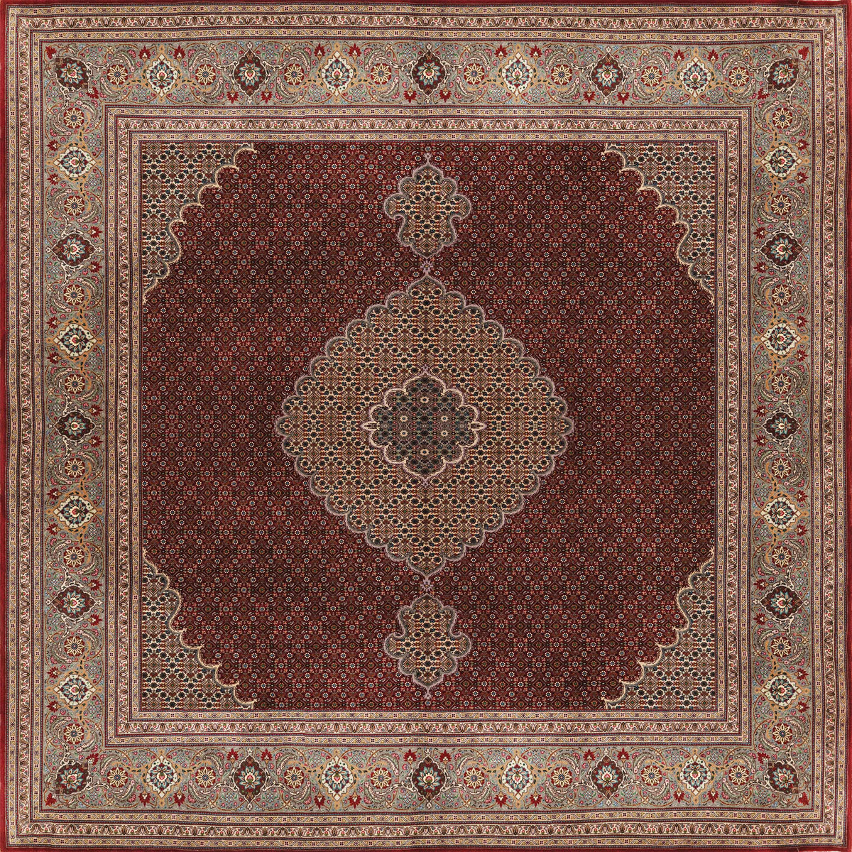 The Elysian Weave - Washable Rug (JRN1001) features rich red tones, a central medallion, floral motifs, and ornate beige, gold, and brown borders with dense detailing for a timeless Persian-inspired look.