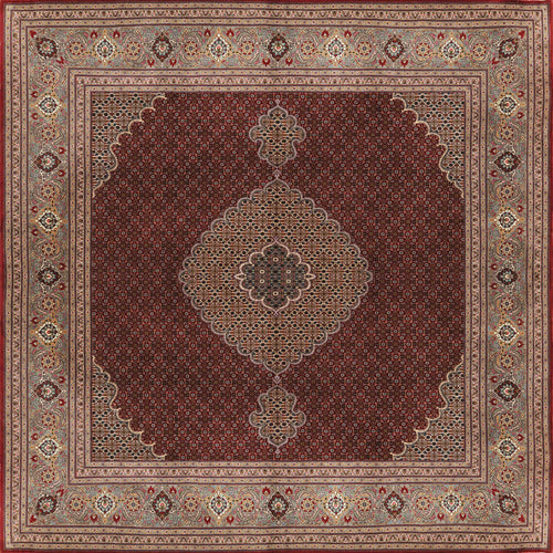 Bild 1 in Galerieansicht laden. The Elysian Weave - Washable Rug (JRN1001) features rich red tones, a central medallion, floral motifs, and ornate beige, gold, and brown borders with dense detailing for a timeless Persian-inspired look.
