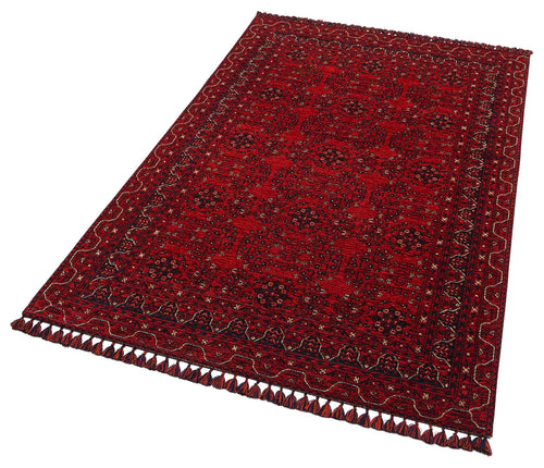 Load image 1 in gallery view. The Ember Stitch - Washable Kilim - BHR02 is a rectangular red rug with geometric borders and intricate patterns, fringed tassels on shorter edges, shown at an angle against a white background.