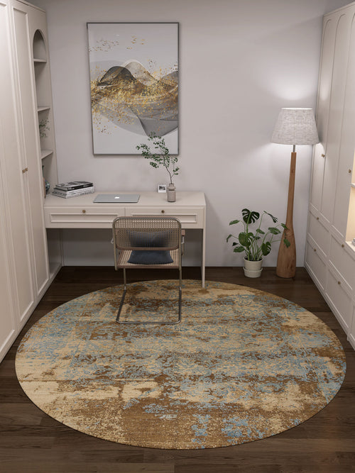Load image 1 in gallery view. A modern home office with a white desk, rattan chair, lamp, and artwork. The Enchanted Threads - Washable Rug - JRS002 in blue and brown covers the floor—perfect for high-traffic or allergy-sensitive spaces.