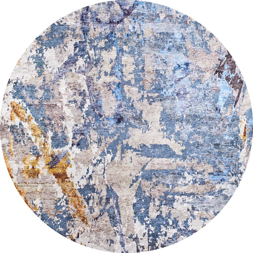 Load image 1 in gallery view. The Enigmatic Elegance - Washable Rug - JR787 features a round shape, blue base, and abstract pattern in blue, beige, gray, yellow, and brown. Its painterly design is textured and ideal for high-traffic areas.