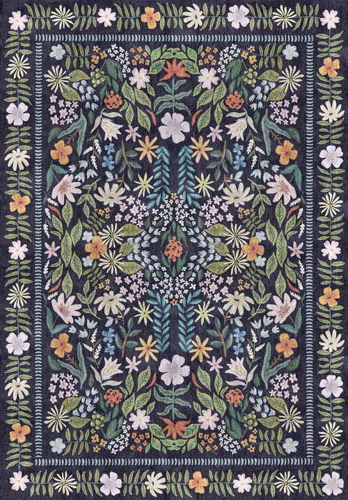 Load image 1 in gallery view. Navy blue rug with a symmetrical botanical pattern of multicolored flowers and leaves and a floral border.