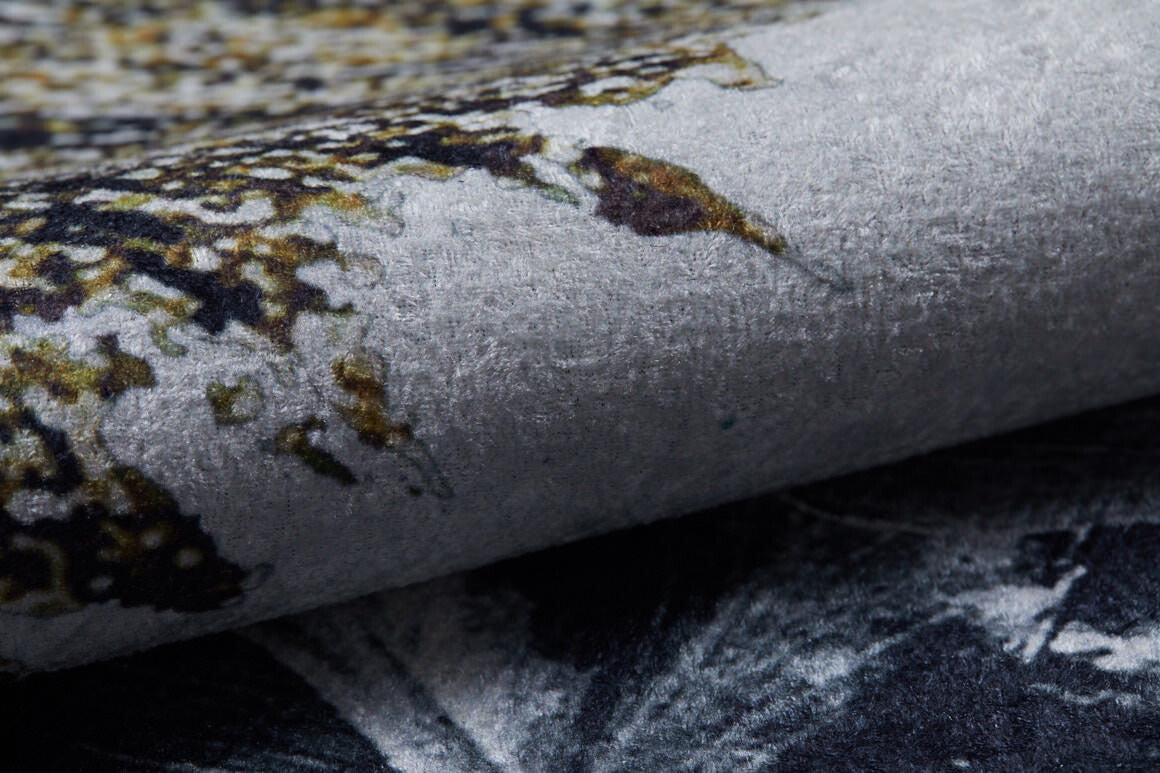 Close-up of the Funky Floral Frenzy - Machine-Washable Rug JR1376 (Custom Size), featuring a textured, mottled pattern in gray, black, yellow, and brown—durable for high-traffic areas with fine fibers and detailed craftsmanship.