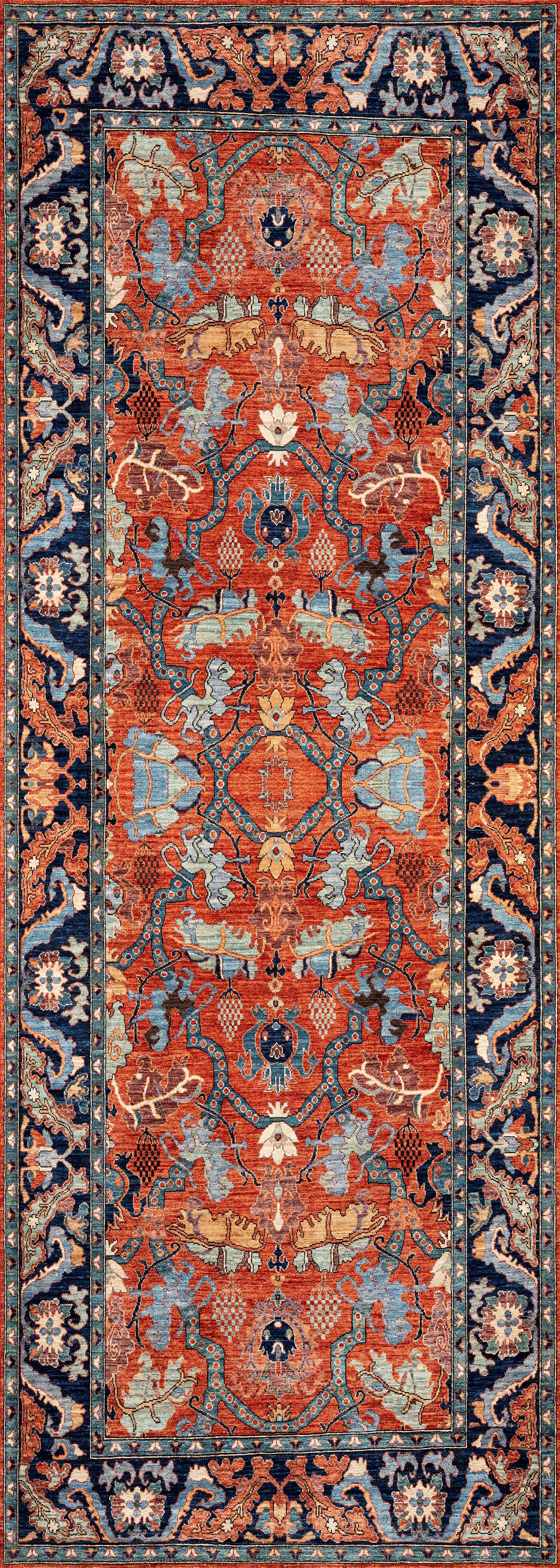 The Galea Turkish-Design Coral Washable Rug (LCC3027) features a Persian-style look with ornate floral and geometric patterns in red, blue, cream, and gold. Its durable, washable design is ideal for high-traffic areas.