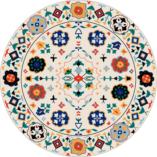 Load image 1 in gallery view. The Global Gathering - Washable Rug - JR608 features a circular, multicolored geometric and floral pattern with blue, red, orange, green, and yellow motifs on a light background—perfect for high-traffic areas.