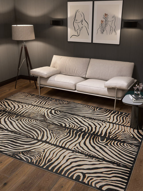 Bild 1 in Galerieansicht laden. A modern living room with a beige sofa, tripod floor lamp, and two abstract prints features the Gossamer Fade - Washable Rug - JRN44. Its stylish design and washable material make it perfect for high-traffic, allergy-friendly spaces.
