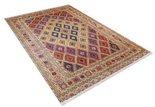 Load image 1 in gallery view. The Grandiose Grace - Washable Rug - JR44 (Custom Size) features geometric diamond and star patterns in red, gold, and blue with intricate borders and fringed edges, offering style and durability for high-traffic spaces.