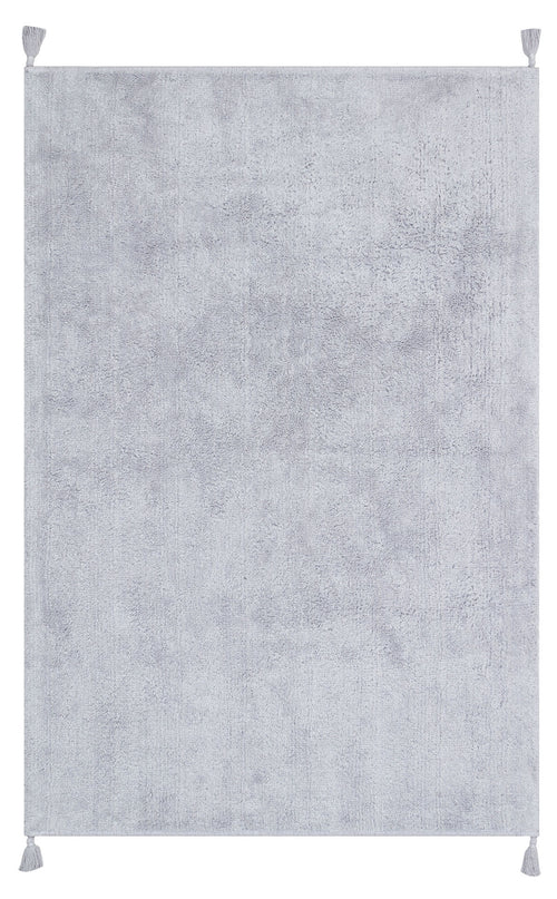 Load image 1 in gallery view. The Grey Snug - Washable Shaggy - CBNPLAIN is a large, rectangular grey cotton rug with a soft, plush texture and tassels at each corner. Its plain design with no patterns suits any modern bedroom and it's easy to wash.