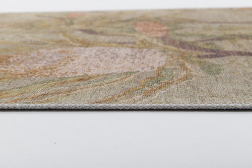 Load image 1 in gallery view. A close-up side view of the Dreamweaver's Loom - Washable Rug - JRS001, featuring a thin, flat weave and a subtle beige, green, and brown pattern, highlights its edge detail against a plain white background—perfect for stylish green rug seekers.