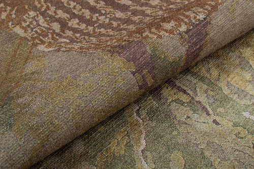 Load image 1 in gallery view. Close-up of the Dreamweaver's Loom - Washable Rug - JRS001, a flat weave tapestry with textured details and abstract, nature-inspired organic shapes in muted brown, green, and beige tones.
