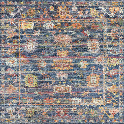 Load image 1 in gallery view. Navy blue traditional rug with a distressed finish, featuring a multi-colored floral medallion pattern and a border.