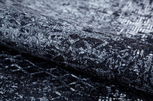 Load image 1 in gallery view. A close-up of the Infinity Garden - Washable Rug - JR1749 (Custom Size) in gray-anthracite, featuring a textured abstract black and gray geometric pattern—durable and ideal for high-traffic areas.