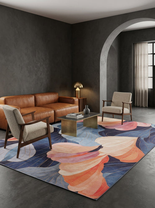 Load image 1 in gallery view. Modern living room with dark gray walls, brown leather sofa, 2 armchairs, a brass side table, and the Iris Abstract Floral Washable Rug - MDJ009 (Custom Size) featuring blue, pink & orange abstract patterns on the floor.