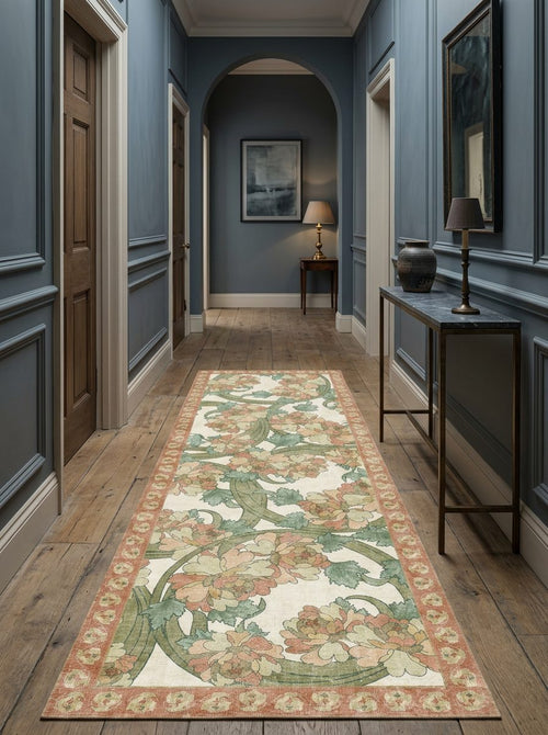Load image 1 in gallery view. Cream runner rug with green and peach floral pattern and a decorative border, styled in a blue-walled hallway.