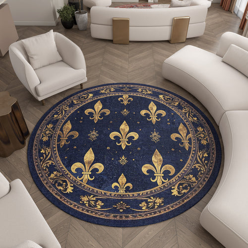 Load image 1 in gallery view. Round navy blue rug with gold fleur-de-lis pattern and ornate border, styled in a modern living room.