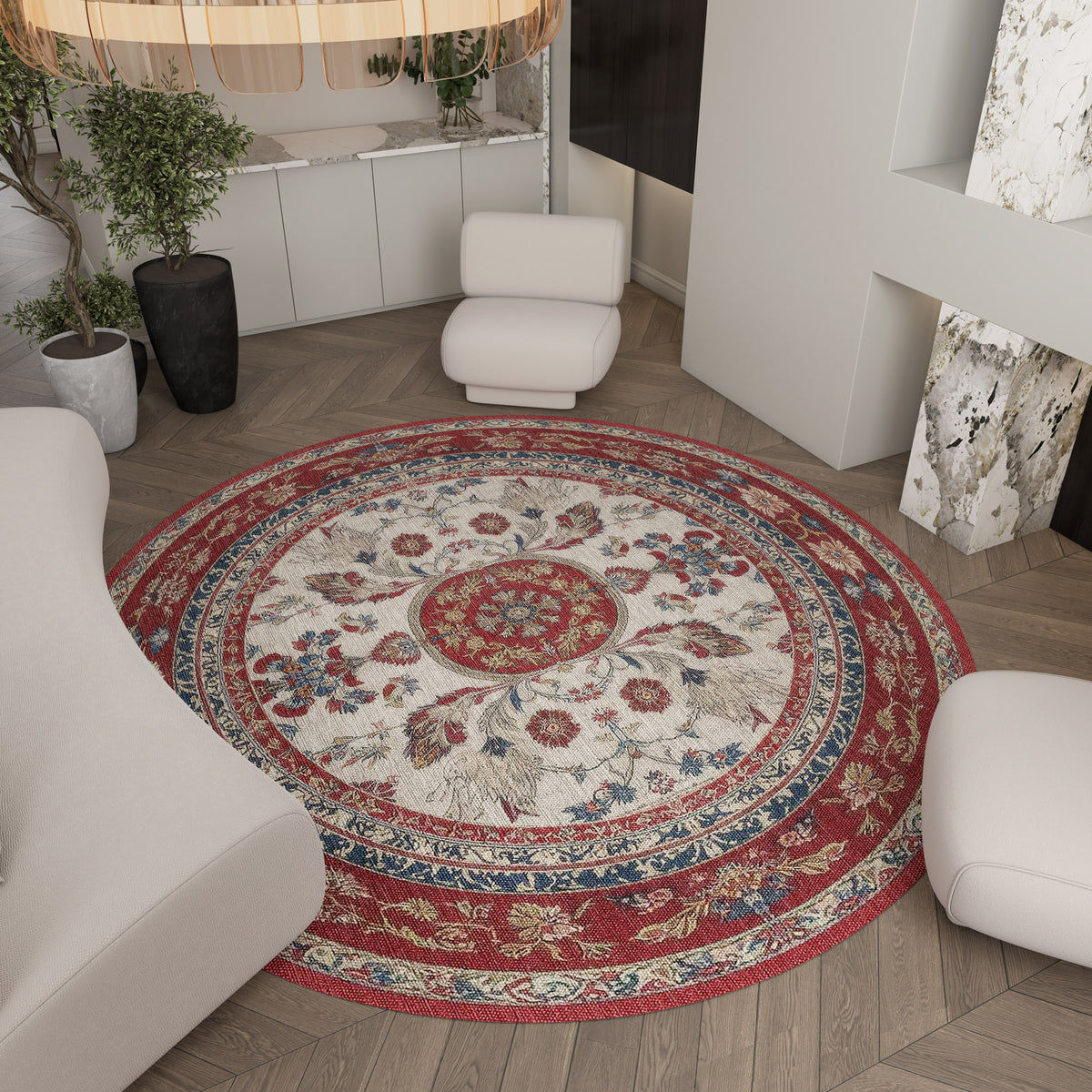 Round rug with a red, blue, and cream floral medallion pattern, styled in a modern living room.