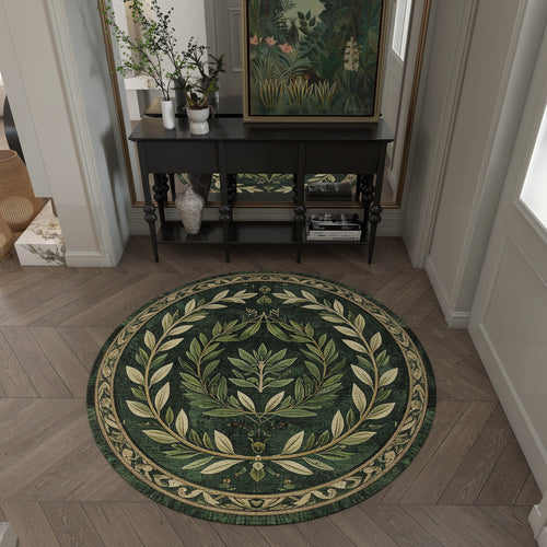 Load image 1 in gallery view. Round dark green rug with a cream botanical laurel leaf pattern, styled in a classic entryway.