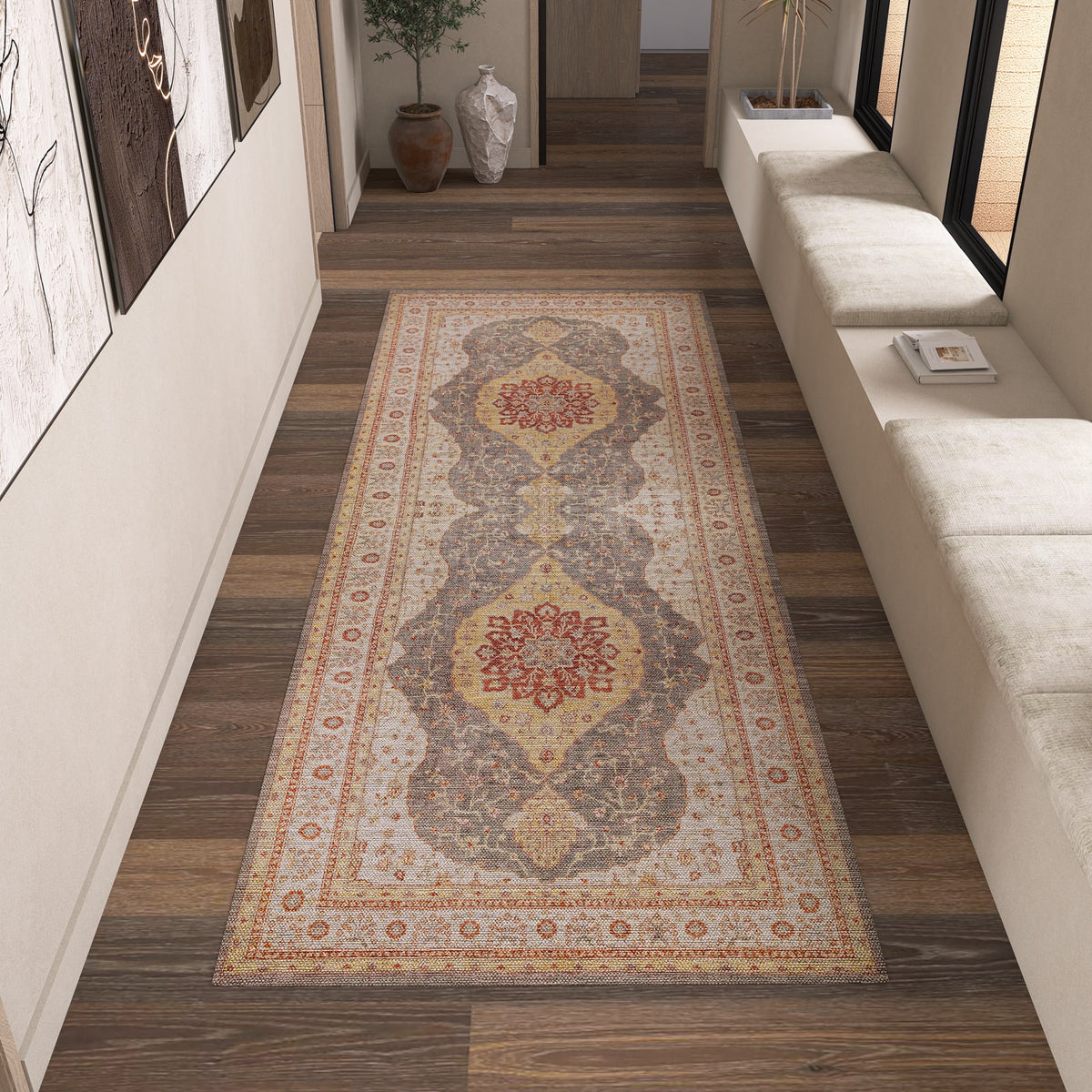 Grey and yellow runner rug with a traditional floral medallion pattern, styled in a modern hallway.