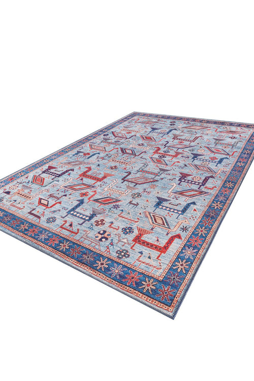 Load image 1 in gallery view. The Birdwatcher's Dream Blue Washable Rug - LCC3020 features a rectangular light blue base with vibrant geometric and animal patterns in red, orange, and blue, bordered by a dark blue floral edge. Ideal for high-traffic spaces, it adds playful style to any room.