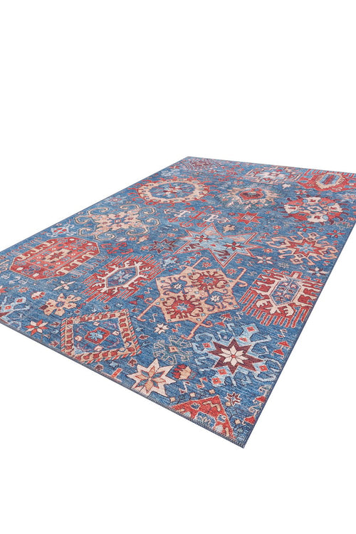 Load image 1 in gallery view. The Kaleidos Authentic Blue Washable Rug (LCC3028) showcases intricate multicolored geometric and floral patterns. Displayed on a white background, this rectangular rug is ideal for high-traffic areas and easy to clean.