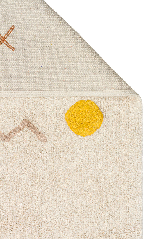 Load image 1 in gallery view. The Little Dream - Washable Shaggy - CBN12 is a beige textured plush cotton rug featuring a yellow circle, brown zigzag, and orange X, shown partially folded at one corner—ideal as a washable shaggy rug for any kids’ room.