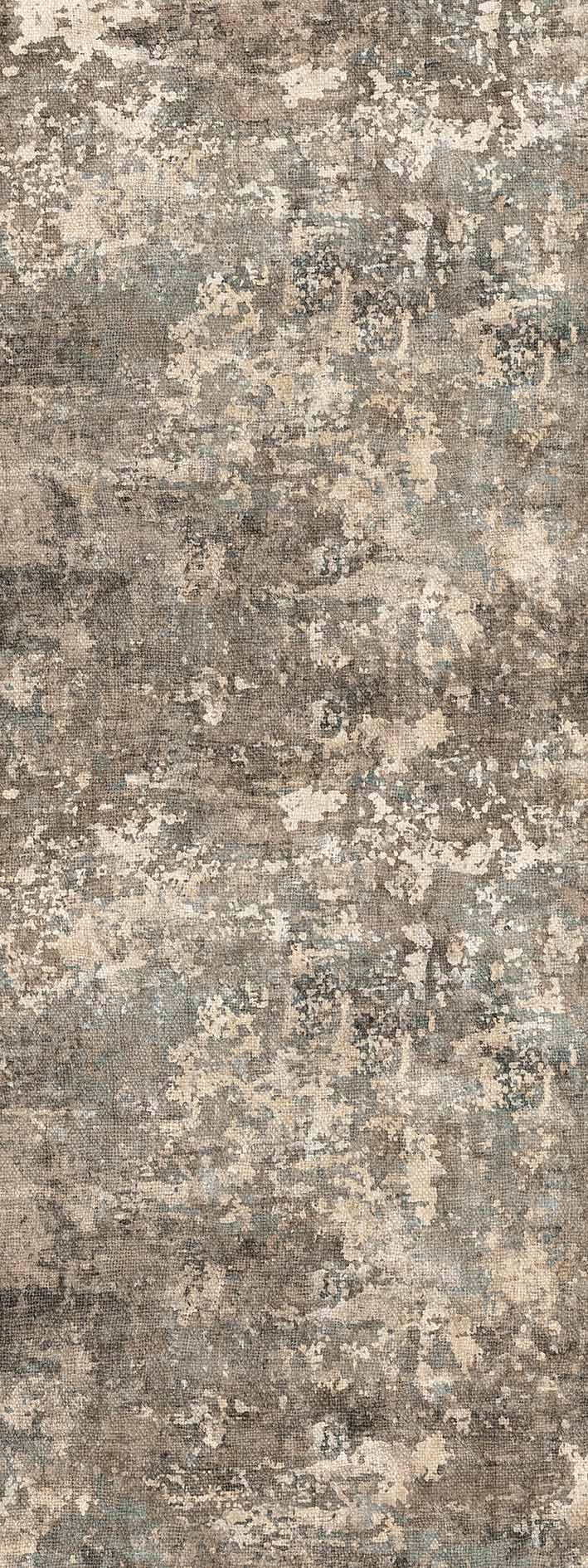 Grey, beige, and blue area rug with a distressed, abstract mottled texture.