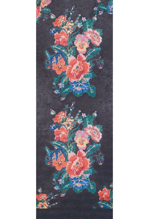 Load image 1 in gallery view. The Meadow Dream - Washable Rug - JR2001 features a dark black background with two vertical clusters of vibrant pink, red, orange, blue, and green flowers in a stylized design—ideal for high-traffic areas.