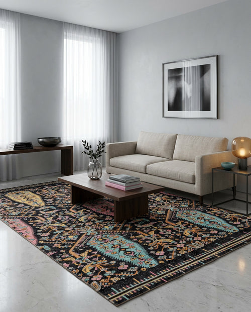 Bild 1 in Galerieansicht laden. A modern living room featuring a beige sofa, wooden coffee table, decorative vases, abstract wall art, and the Midnight Bazaar Area Rug APX1911 on a white marble floor, with sheer curtains letting in natural light.