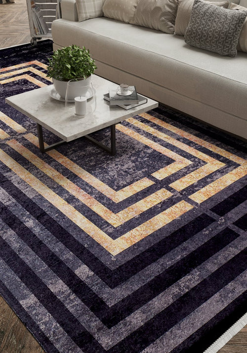 Load image 1 in gallery view. A modern living room with a beige sofa, textured cushions, a marble coffee table, and the Minimalist and Clean - Washable Rug - JR1407 (Outlet) US featuring layered geometric rectangles in dark and light tones.