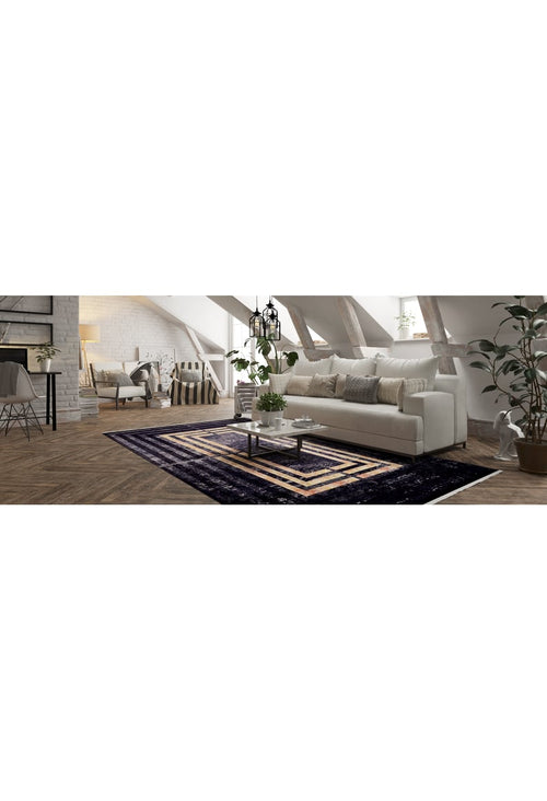 Load image 1 in gallery view. A modern living room features a white sofa, neutral pillows, a glass coffee table, potted plants, and the Minimalist and Clean - Washable Rug - JR1407 (Outlet) US on wooden floors beneath slanted beams and large windows.
