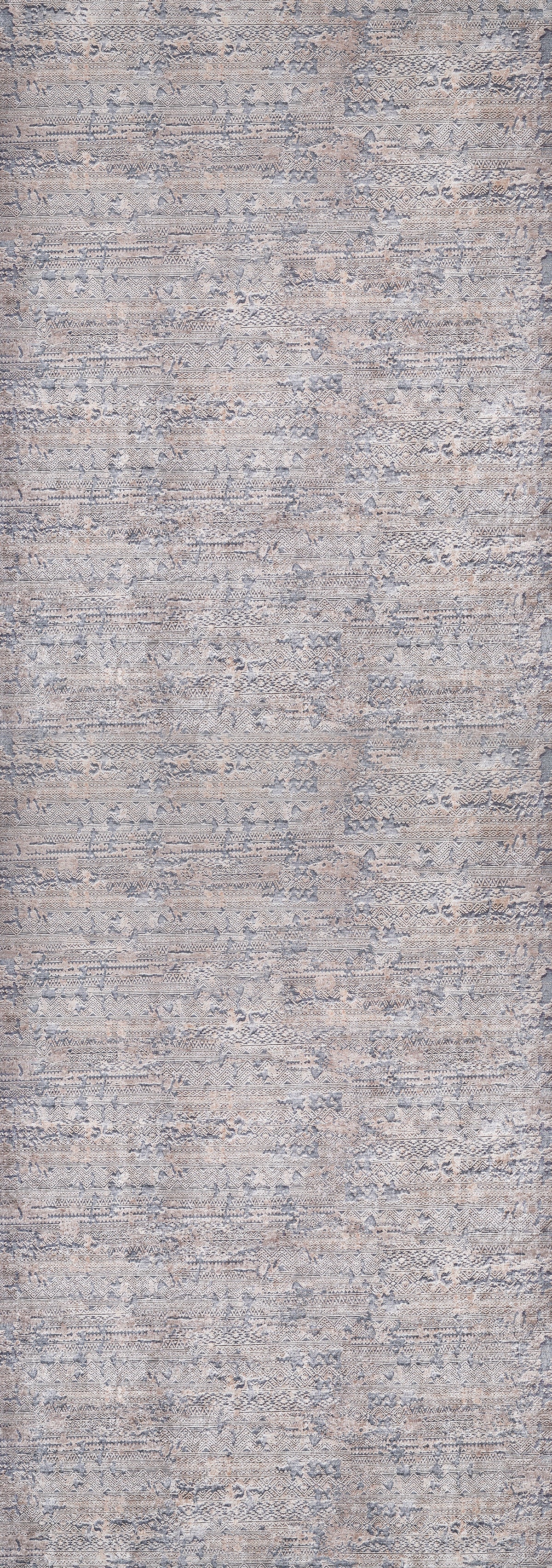 A close-up of the Modern Enigma - Machine-Washable Rug JR1883 shows textured, woven gray and light blue fabric with a subtle, irregular pattern—perfect for high-traffic areas.